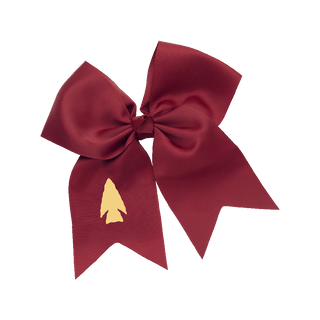Maroon bow with gold spear head at the bottom left of the bow