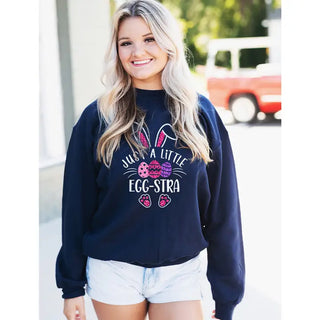 Just a Little Egg-Stra Sweatshirt Funny Easter Cozy Pullover #HPSW-NAVY-EGGSTRA24 - Graphic Sweatshirt - Women’s
