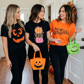 Orange pumpkin-face halloween tote bag